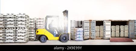 Forklift stuffing aluminum ingot into a container. Aluminum ingot handling and transportation for import and export. Warehouse equipment operation, lo Stock Photo