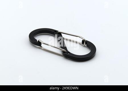 Black and silver carabiner isolated on white background Stock Photo