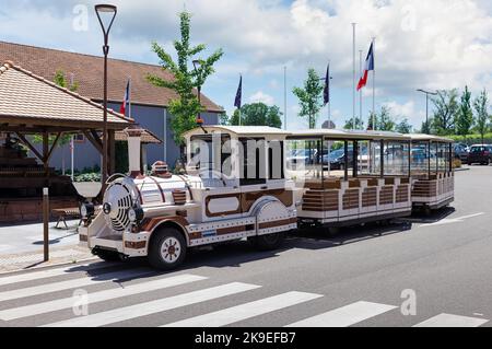 sightseeing steam locomotive in the commune of Eguisheim France Stock Photo