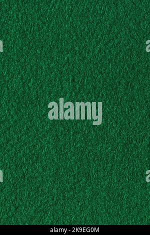 Green color felt textile fabric material texture background. Abstract monochrome dark blue color felt background Stock Photo