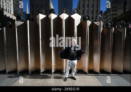 New York, USA. 27th Oct, 2022. Artist Cesar Menchaca poses in front of an art installation at Rockefeller Center celebrating the 2nd annual Mexico Week: Dia De Muertos, New York, NY, October 27, 2022. (Photo by Anthony Behar/Sipa USA) Credit: Sipa USA/Alamy Live News Stock Photo