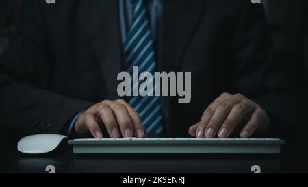 Business man using keyboard computer on desk. Stock Photo