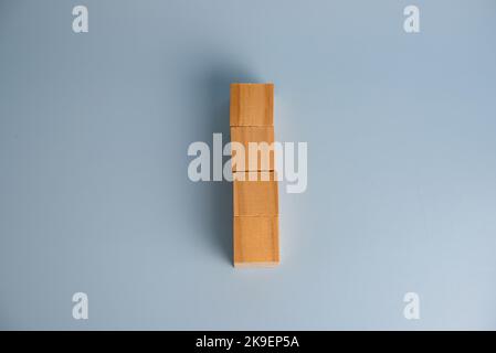 Four blank wooden block cubes on background for your text. Business concept template and banner. Stock Photo