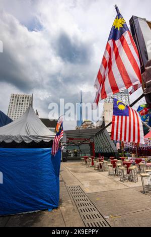 Kuala Lumpur, Malaysia - August 21, 2022: The new Malaysian icon and landmark, the Merdeka 118 or KL 118 Tower. Malaysia flag in foreground. Cityscape Stock Photo