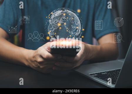 Hands of business holding global digital Technology education online networking and data exchanges connection icon virtual concept. Stock Photo