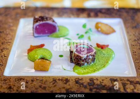 Seared ahi tuna steak at Mozaic, a high end restaurant in Bali, Indonesia Stock Photo