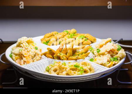 Fried seafood platter at a resort hotel buffet restaurant in Palawan, Philippines Stock Photo