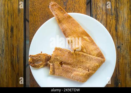 Thai crispy dried squid at a Thai restaurant in Iloilo City, Philippines Stock Photo