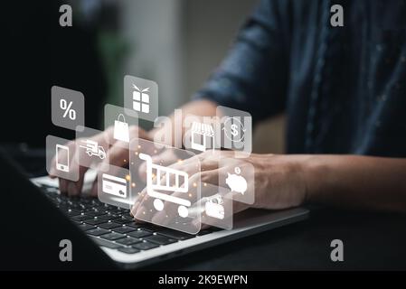 Man using laptop shopping online internet banking search information and payment e commerce digital Technology business finance concept. Stock Photo