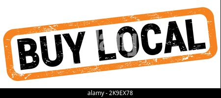 BUY LOCAL text written on orange-black rectangle stamp sign. Stock Photo