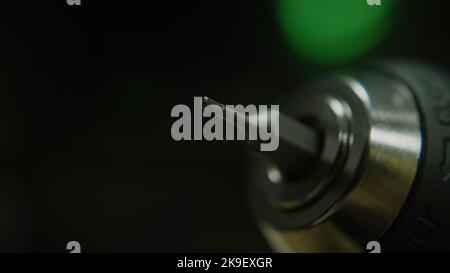 Rotating drill bit micro head, macro extreme close-up, technology and toolkit concept Stock Photo