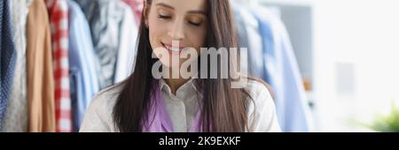 Woman write wonderful idea, realize it in fashion industry, professional atelier Stock Photo