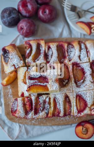 sweet home made plum cake on a table Stock Photo
