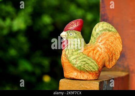 Close-up chicken piggy bank made of clay selective focus Stock Photo