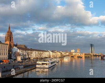 FRANKFURT, GERMANY - FEB 22, 2015:: river Main with boats and view to the new seat of the European Central Bank in Frankfurt, Germany.  A 185 165-metr Stock Photo