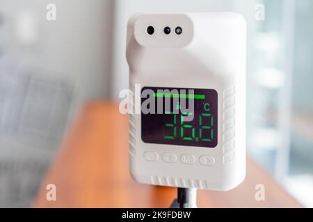 A non-contact digital infrared thermometer at a cafe in Cebu City, Philippines Stock Photo