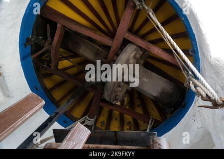 View of the intereior of an old flour cereal grain Portuguse windmill. Stock Photo