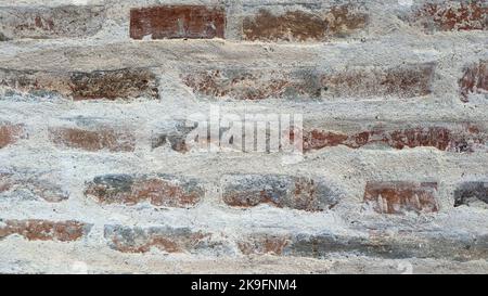Old ancient vintage white and beige brick stone wall texture background  Stock Photo