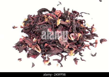 Karkade tea.  Bunch of dry hibiscus tea isolated on white background, top view Stock Photo
