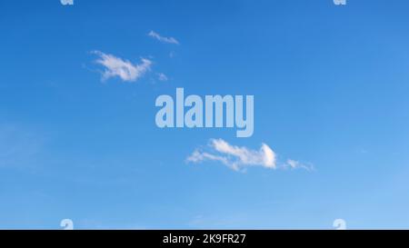 Panorama of big blue sky with little  white clouds Stock Photo