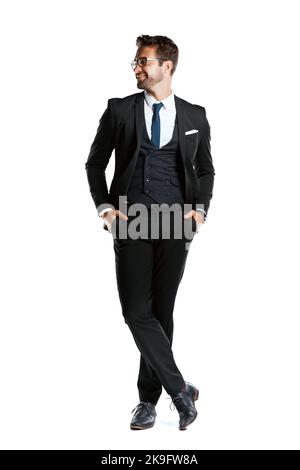 Look smart and be determined. Studio shot of a handsome young businessman posing against a white background. Stock Photo