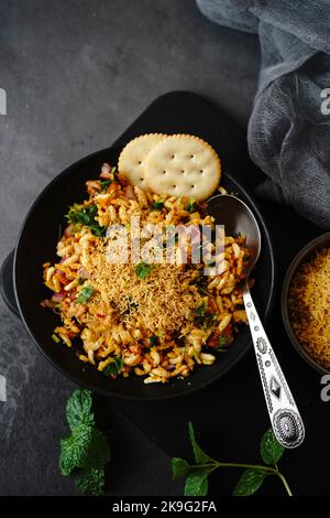 Mumbai Bhelpuri - Popular Indian street food chaat withpuffed rice, selective focus Stock Photo