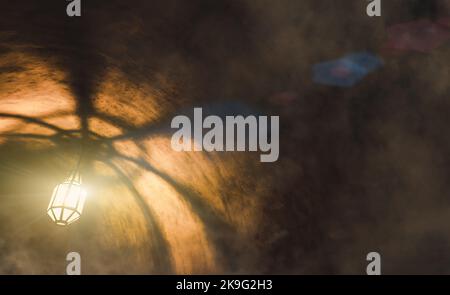 light from the lamp and the shadows in the mysterious corridor in old dungeon Stock Photo