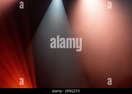 Background of red light of stage from spotlights projectors Stock Photo