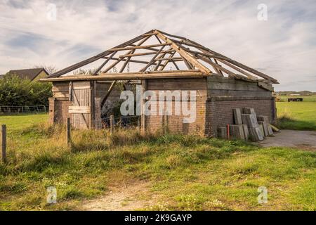 Texel, Netherlands. October 2022,. An old, half collapsed barn on Texel. High quality photo Stock Photo