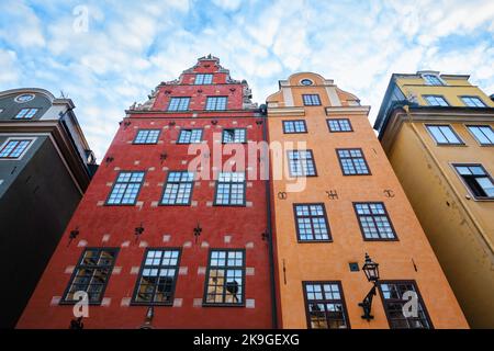 Stockholm, Sweden - Sept 2022: Red and Yellow iconic buildings on Stortorget, a small public square in Gamla Stan Stock Photo