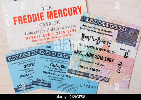 Ticket stubs for Genesis, David Bowie and Freddie Mercury tribute concerts in the 1980s & 1990s at Wembley Stadium, London, UK Stock Photo
