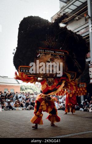 Reog Ponorogo traditional masked dance performance on the street Stock Photo