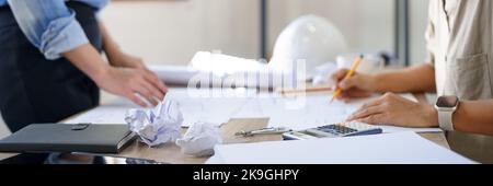 Engineering construction concept, Two female engineers discussing about problem of new project. Stock Photo