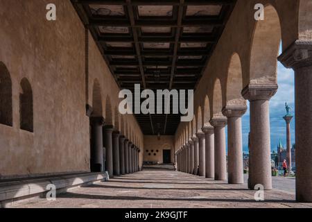 Stockholm, Sweden - Sept 2022: The collonnade arch passage and brick facade at the Town City hall on the waterfront Riddarfjärden Stock Photo