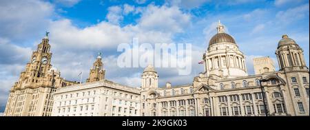 The world famous Three Graces made up of the Royal Liver Building, the Cunard Buidling and the Port of Liverpool Building pictured on the Liverpool wa Stock Photo