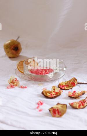 Vertical shot of pomegranates to be juiced to show the theme and aesthetic of autumn season Stock Photo