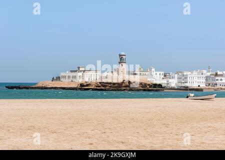 Al Ayjah lighthouse built by the Portuguese and a beach, Sur, Sultanate of Oman, travel destination Stock Photo