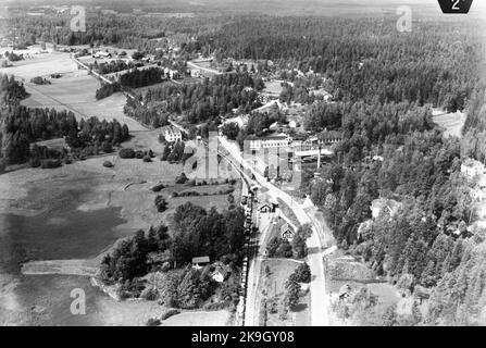 Aerial photo over the station station was built in 1874, but the premises have since been modernized. One -storey station building in wood. Stock Photo