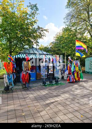 Kiel, Germany - 03. October 2022: A market stall with flags and jackets in the centre of Kiel Stock Photo