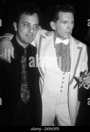 **FILE PHOTO** Jerry Lee Lewis Has Passed Away at 87. Billy Joel Jerry Lee Lewis 1986 Photo By John BarrettPHOTOlink.net/MediaPunch Stock Photo