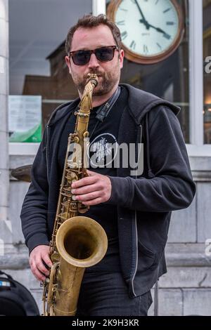 Cork, Ireland. 28th Oct, 2022. Today is the first day of the 44th Guinness Cork Jazz Festival. As well as bands playing in venues, the streets of Cork city host impromptu gigs. 'Hyde Park Brass' from Leeds, UK played at the festival. Credit: AG News/Alamy Live News Stock Photo