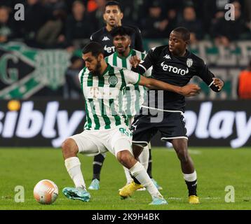 Petrus Boumal of Ujpest FC competes for the ball with Jose Marcos