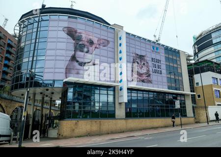 London- October 2022: Battersea Cats & Dogs Home entrance from Battersea Park Road, an animal rescue centre Stock Photo