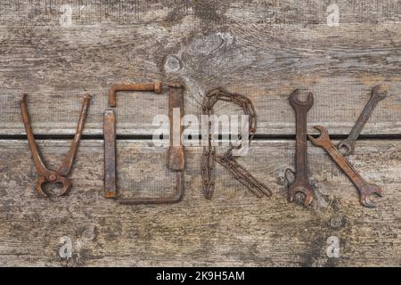Word WORK made of rusty hand tools Stock Photo