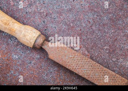 old file on rusty rough metal surface Stock Photo