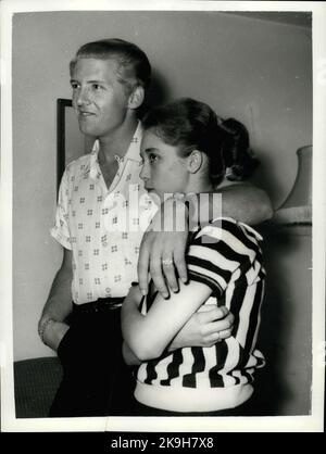 May 23, 1958 - 22 Year-Old American Rock 'N Roll Singer Arrives Here With His 15 Year Old Wife; Jerry Lee Lewis, the American rock ' n roll singer, flew into London yesterday with a shock for his fans. For the girl who arrived with him turned out to be his 15 year old wife of two months. her name was Myra, and she is his third wife. Jerry was first married at 15 and again at 17, but this time he says he has found the right girl. When asked if she thought that fifteen was too young to be a wife, Myra explained that back at her home town Memphis Tennessee, you can marry at the age of ten. Flaxen Stock Photo