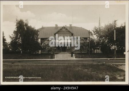 Track side of station with view at station house and platform with ...