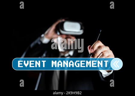 Conceptual display Event Management. Word Written on everything that happens is part of a bigger picture Man Wearing Virtual Reality Simulator Holding Stock Photo