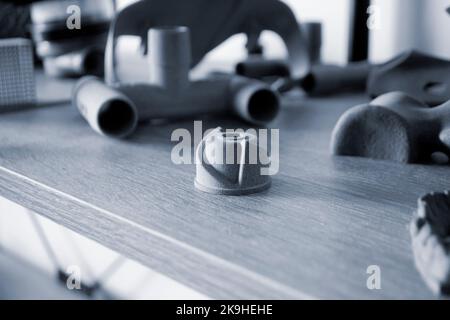 Prototype model printed with powder 3D printer close-up. Abstract black figure printed on a 3D printer from polyamide powder. Multi Jet Fusion MJF. New additive modern progressive 3D priner technology Stock Photo