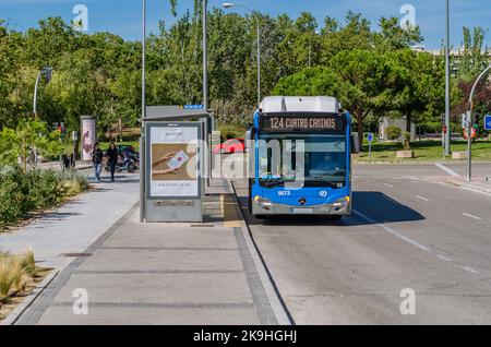 MADRID, SPAIN - OCTOBER 6, 2021: Bus of the municipal transport company of Madrid (EMT) at a stop in the Madrid neighborhood of La Paz Stock Photo